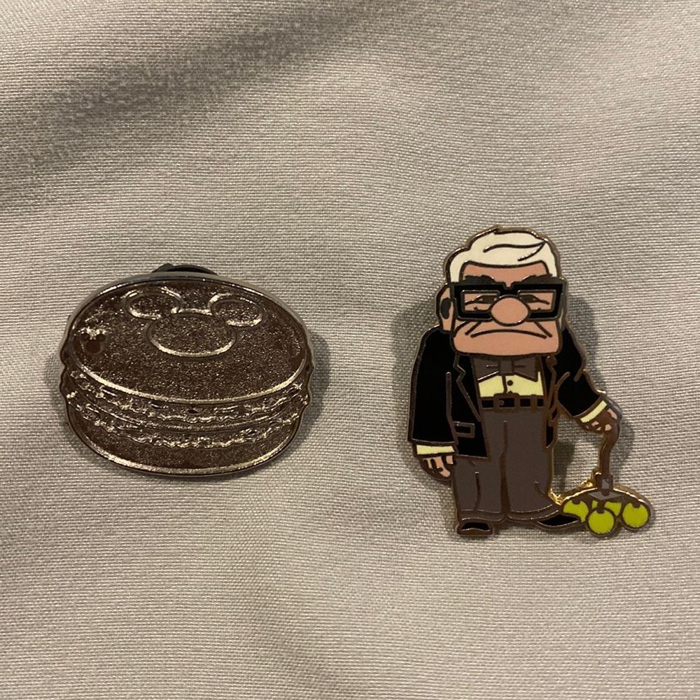 Disney trading pin chaser burger and Carl Fredricksen from up!